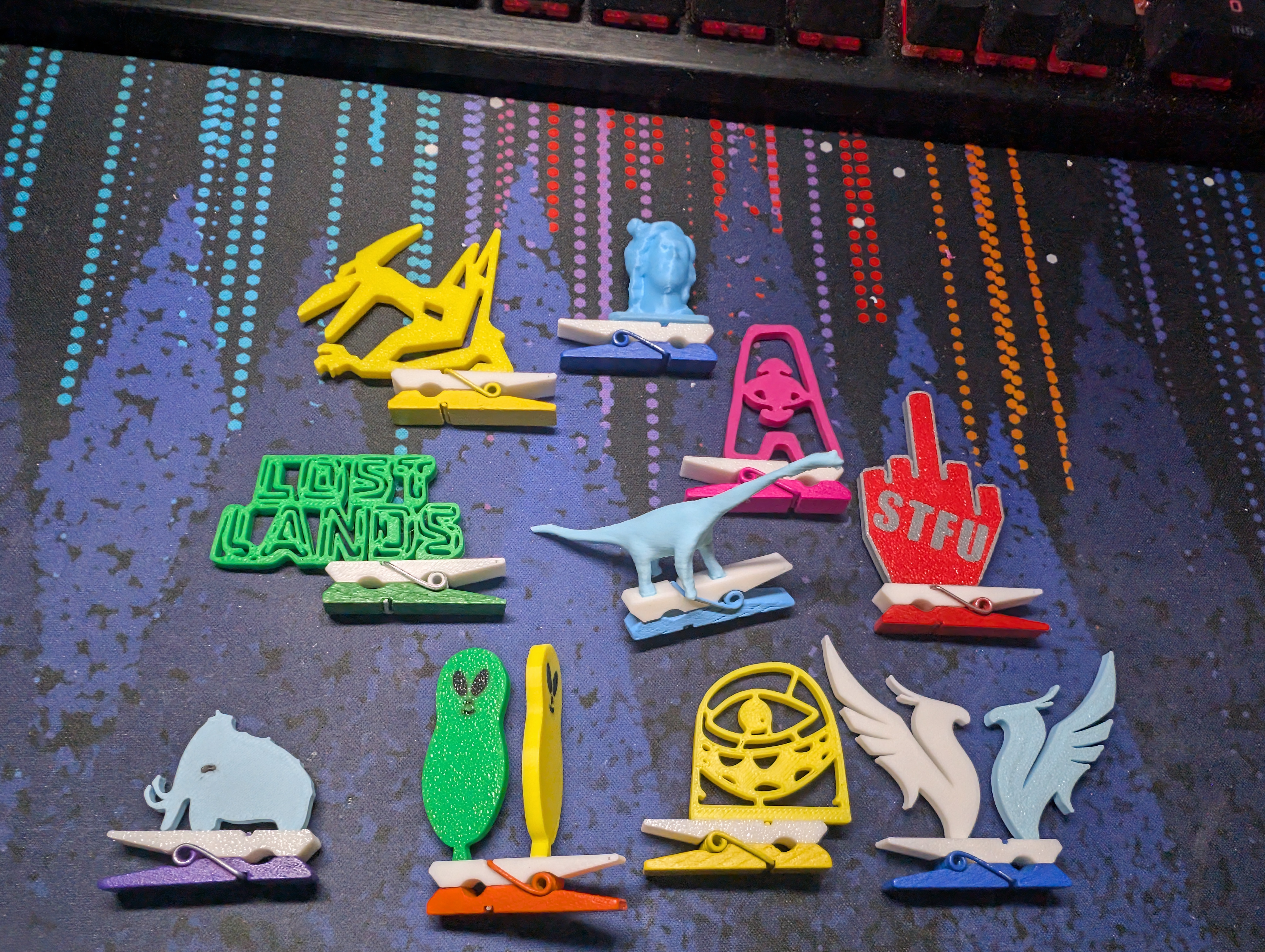 Assorted festival clips on a desk mat